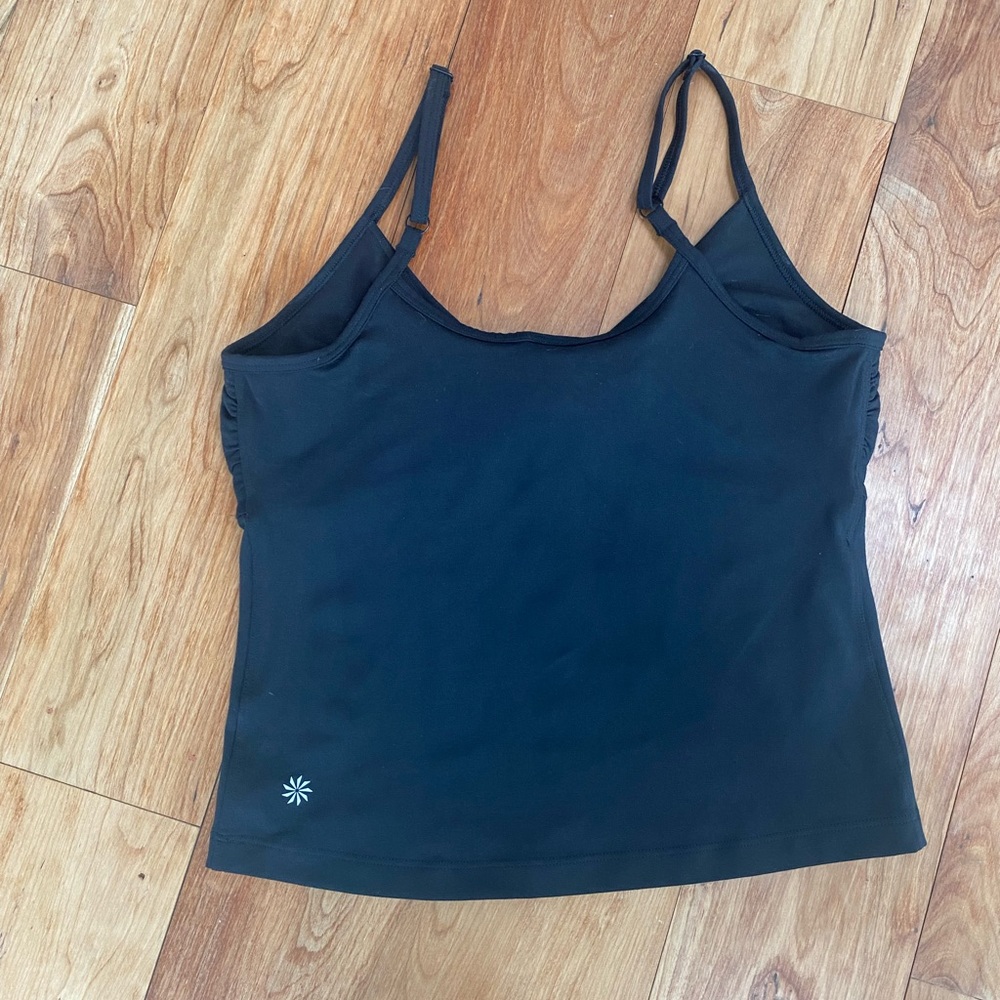 Athleta M tank with adjustable straps and support. Excellent condition.